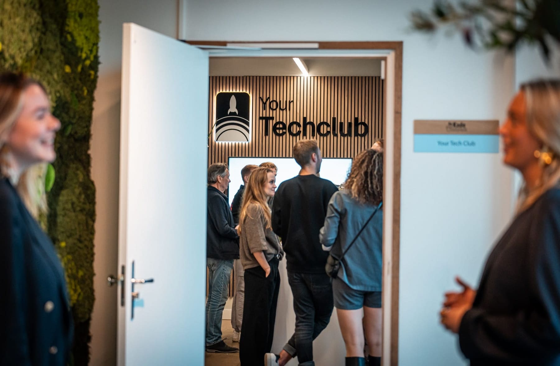 Visitors at the opening of the Your Tech Club office